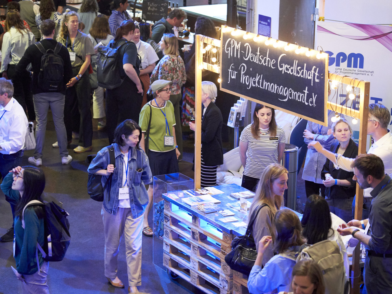 people at partner stands