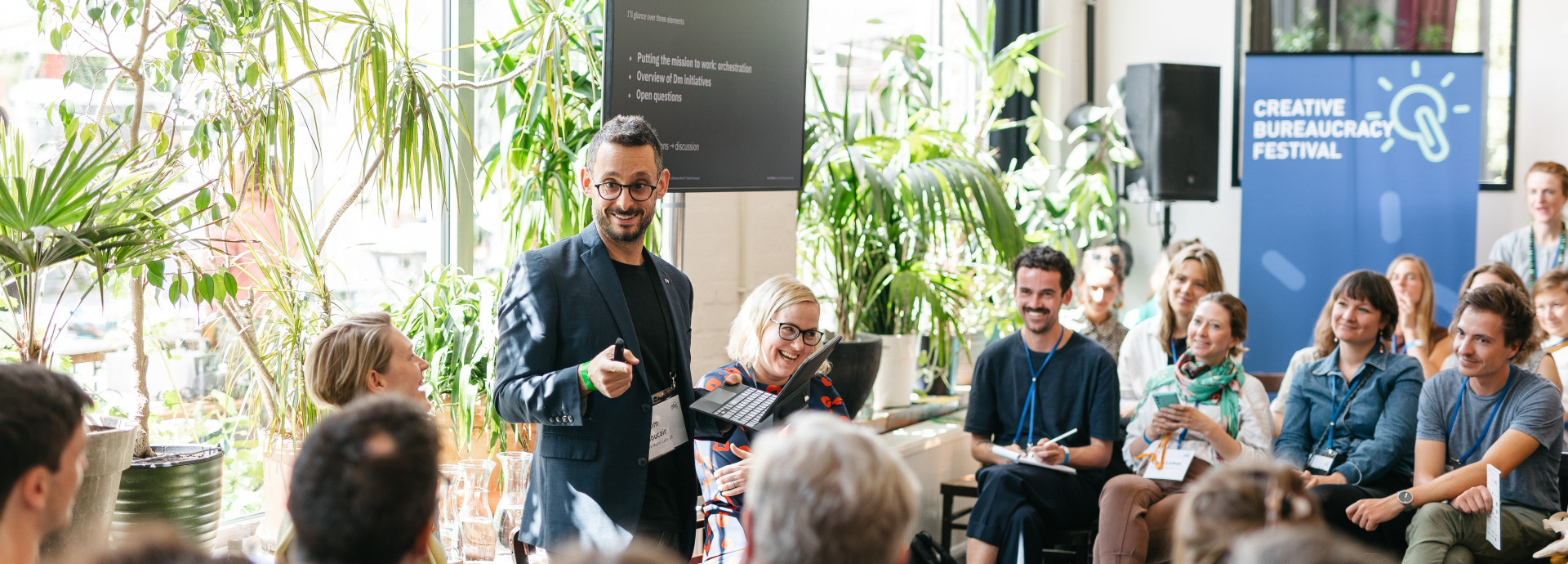 man holding a presentation at the festival 