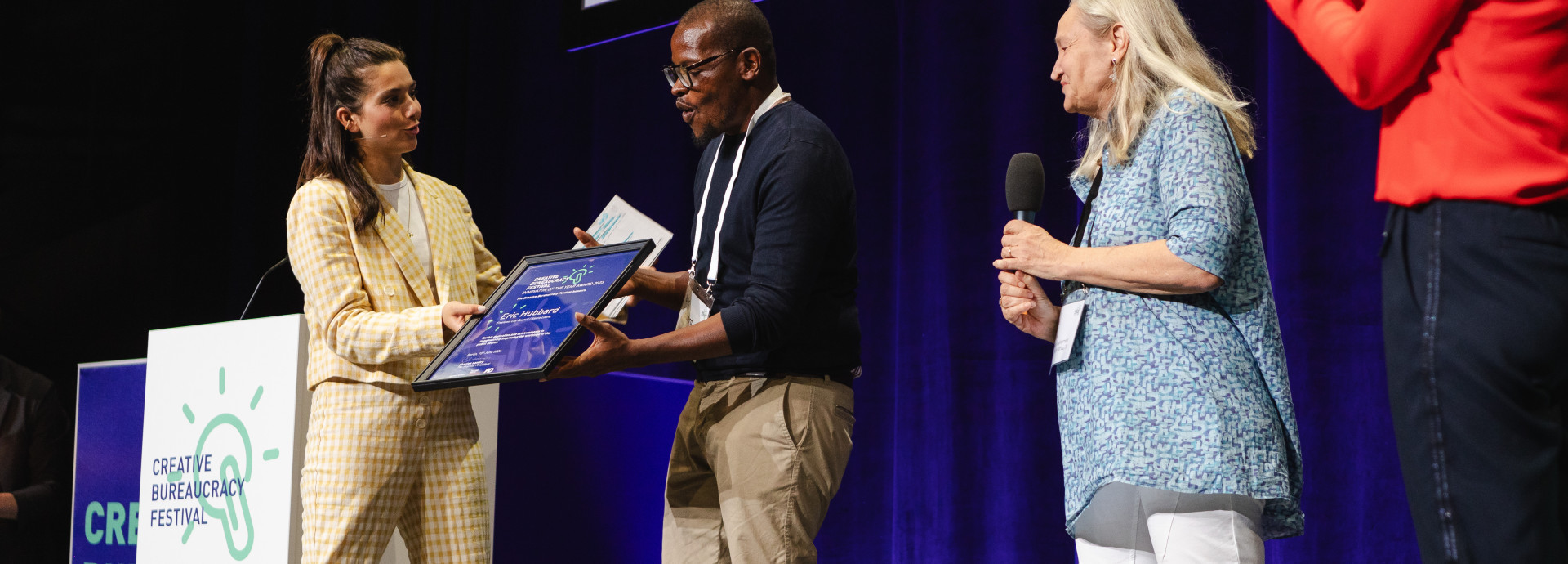 Eric Hubbard receiving the Festival Award on stage
